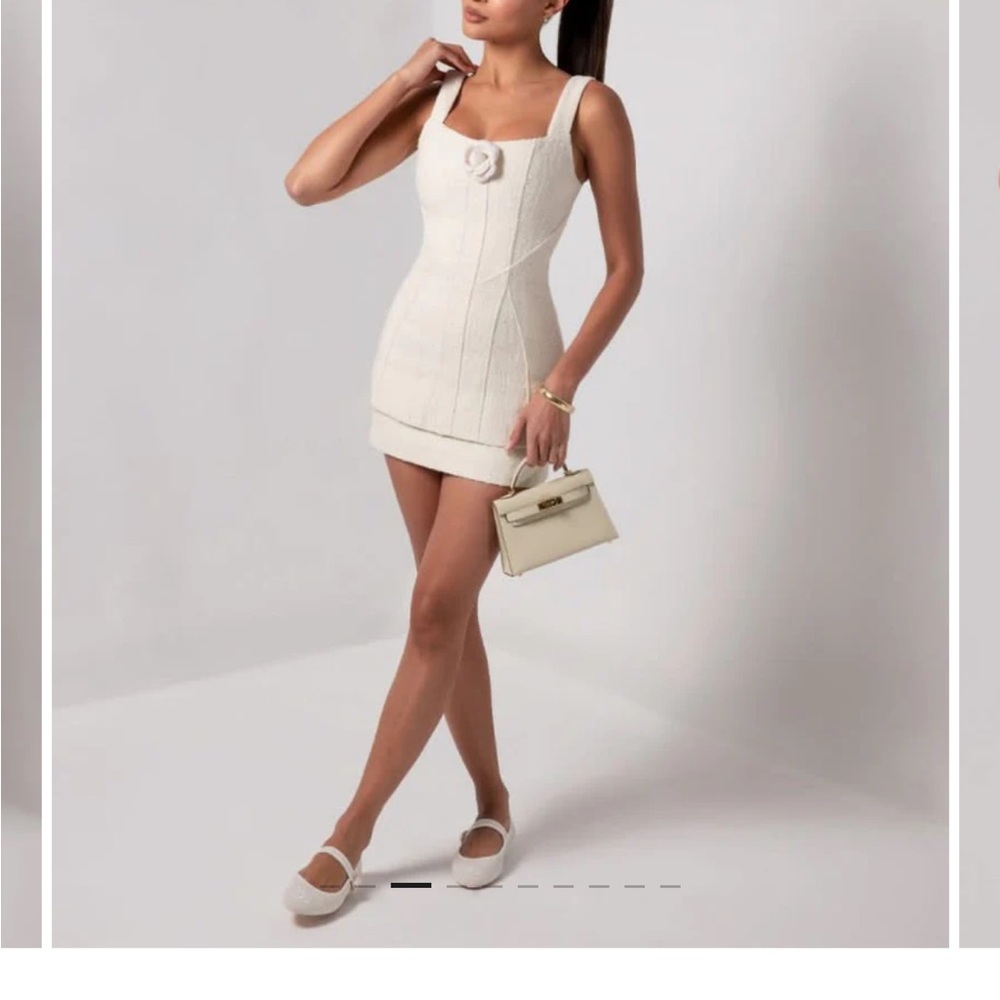 Chic Cream Mini Dress with Floral Accent